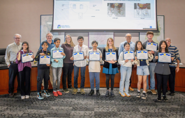 Students holding certificates at Irvine Ranch Water District