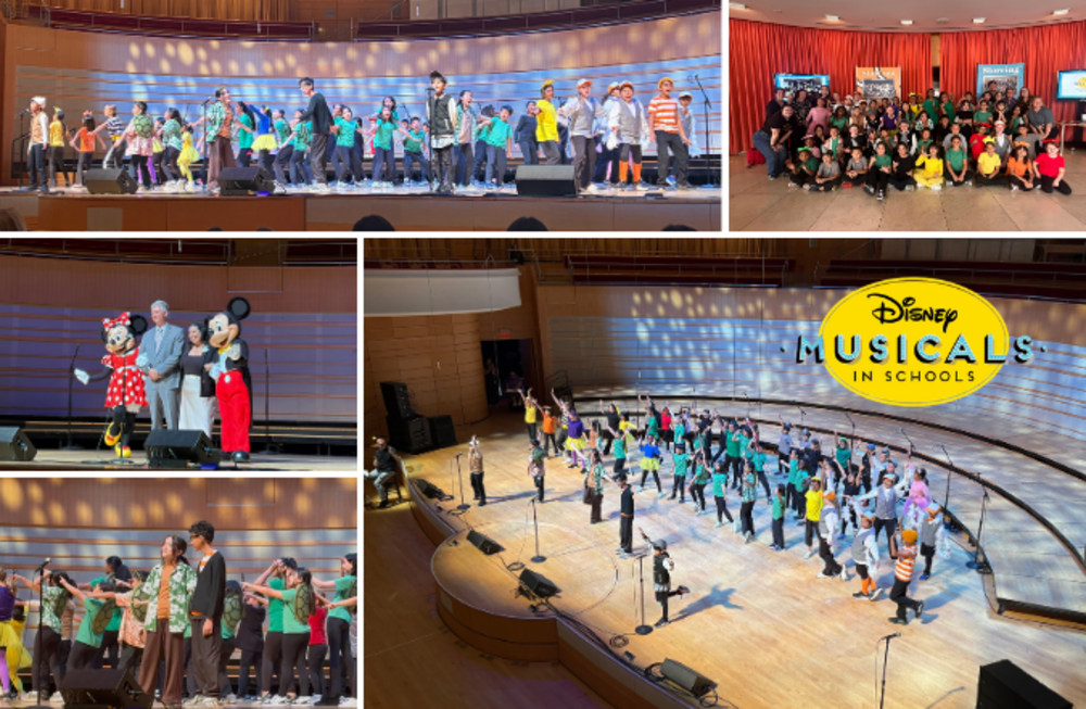 A large group of children in colorful costumes perform on a stage, with a Disney Musicals in Schools logo visible.