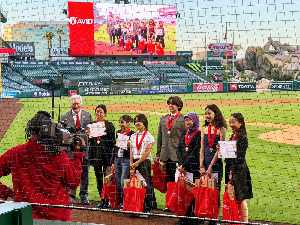 IUSD AVID 8th grade standouts on field at Angels Stadium