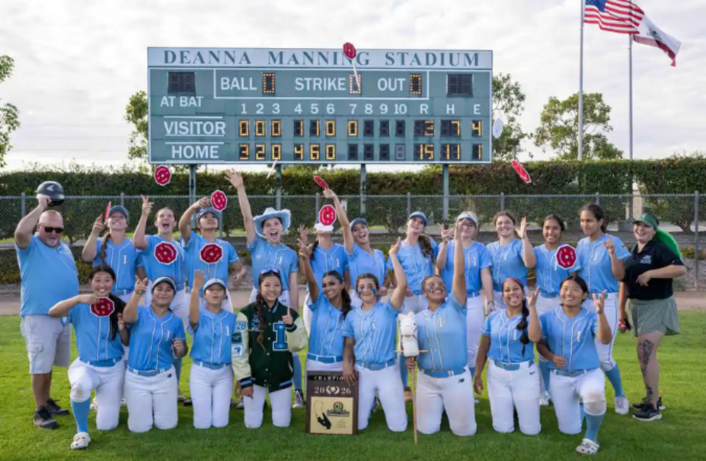IHS Softball Team holding CIF winning plaque and celebrating with CIF patches