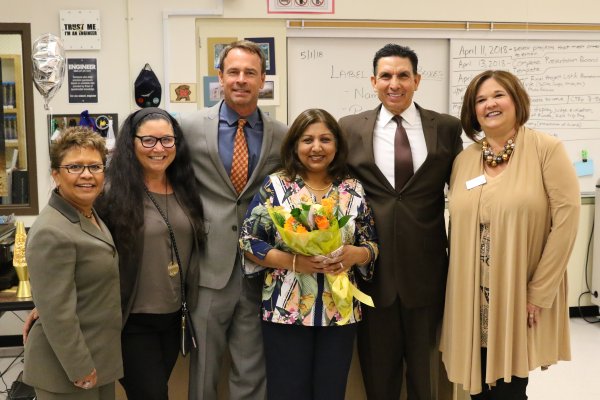 Archana Jain joined by Principal Colunga, Board Member Brooks, Supt. Walker, Supt. Mijares, and Schools First Rep.