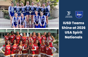 Two cheerleading teams in uniform, one in blue and white, the other in red and yellow, pose with trophies and medals.