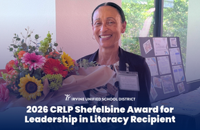 Dr. Natalie Baptiste smiles, holding a large bouquet of colorful flowers and a book, recognized as the 2026 CRLP Shefelbine Award for Leadership in Literacy Recipient.