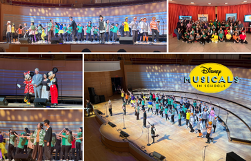 A large group of children in colorful costumes perform on a stage, with a Disney Musicals in Schools logo visible.