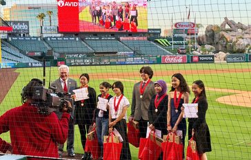 IUSD AVID 8th grade standouts on field at Angels Stadium