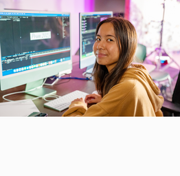 Film production student on computer