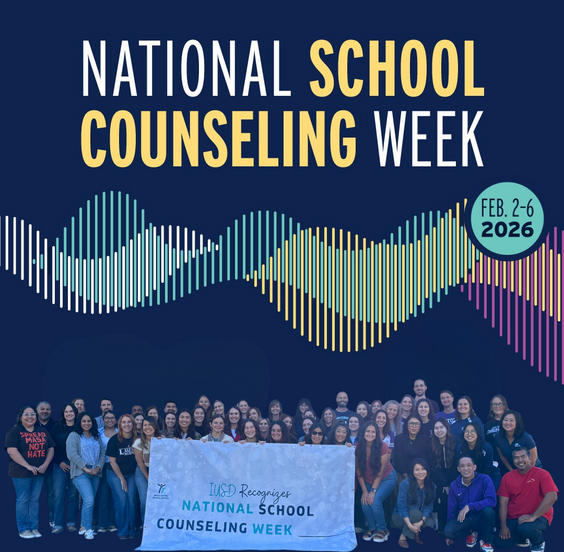 School Counselors smiling in group photo; holding "National School Counselor Week" sign