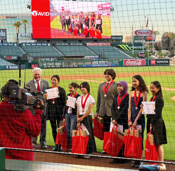 IUSD AVID 8th grade standouts on field at Angels Stadium
