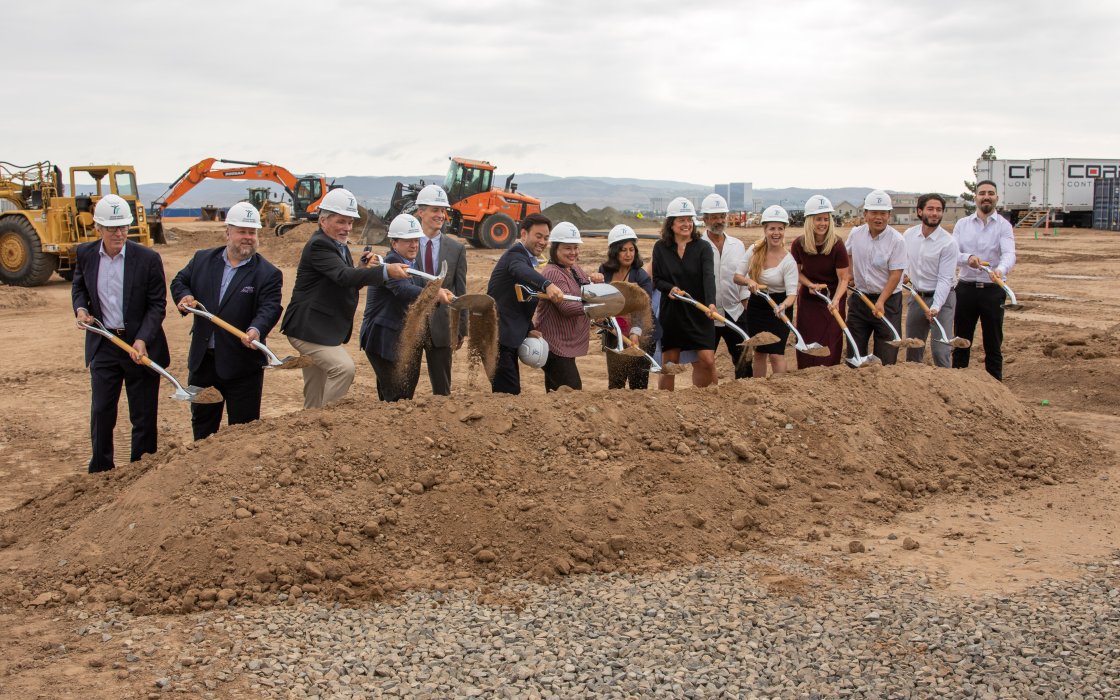City Officials and Developer Employees Posing with Dirt