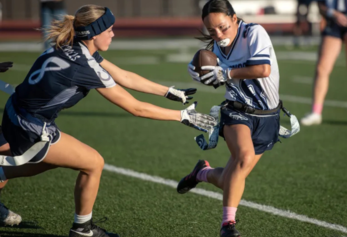 Northwood Flag Football player dodging opponent 