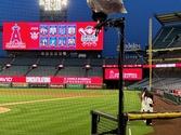 Angels Scholars shown on jumbotron and on the field in their custom Angels jerseys