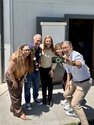 Henry Miller and IUSD Board of Education smile for selfie