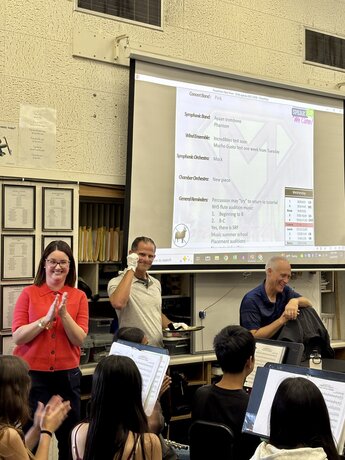 Jeff Morano, Henry Miller, Erin Zoumaras laughing in classroom
